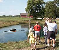 Can you put a pumpkin in the inner tube with our Pumpkin Sling Shot at Knollbrook Farm in Goshen, Indiana?